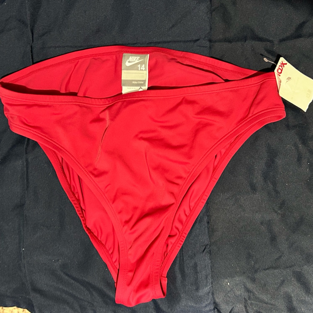 Nike size 14 red women’s swim bottom.